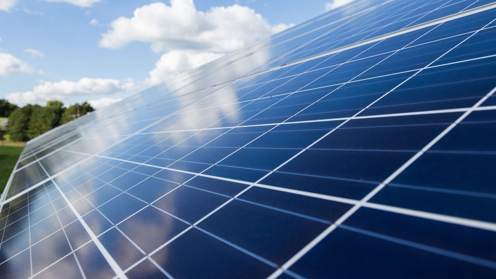 Technician checking solar panels during diagnostics in Howell Township NJ
